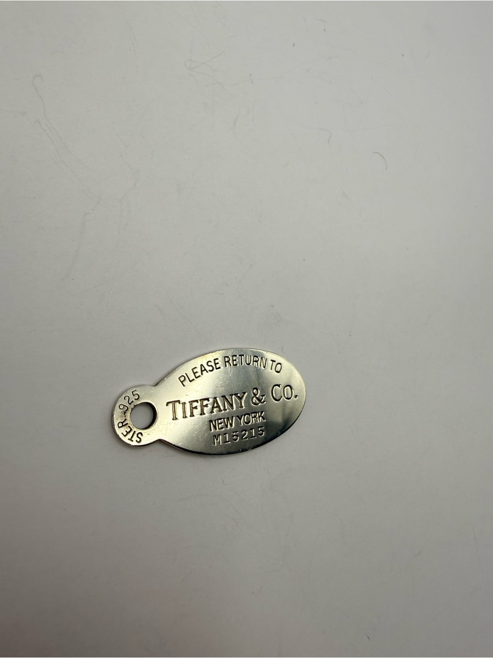Tiffany & Co. Silver Oval "Please Return To" Tag